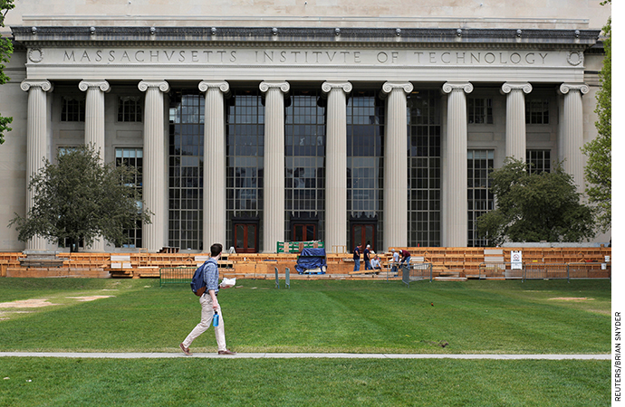 A man walks through Killian Court at MIT in Cambridge