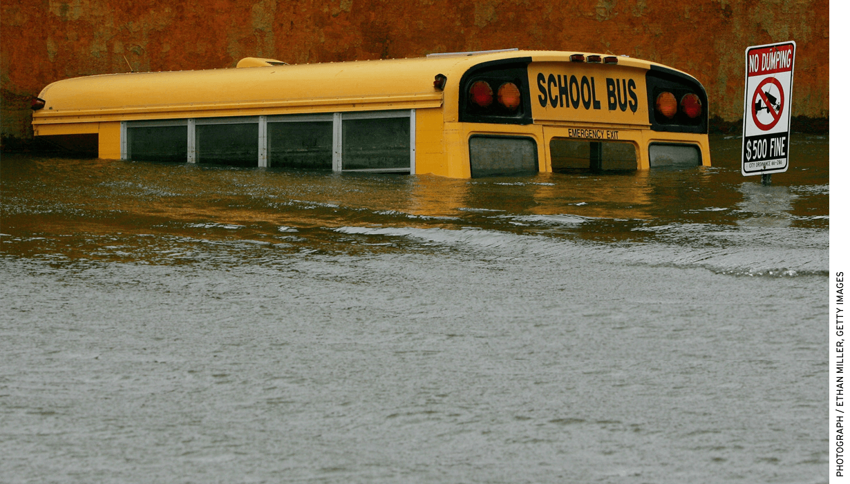 A submerged school bus is seen in the flooded Lower Ninth Ward, September 24, 2005 in New Orleans. Hurricane Rita followed just over three weeks after Hurricane Katrina hit the region.