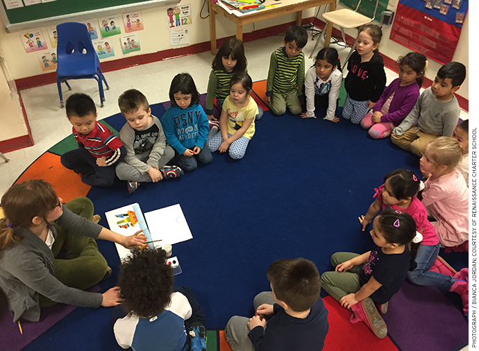 A pre-K class at Renaissance Charter School sings “We Are the World” as a calming and bonding activity.