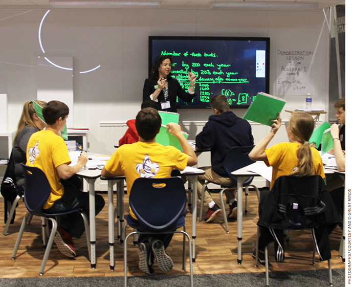 Eureka Math Director Jill Diniz teaches a demonstration lesson on exponential decay to grade 9 students from Lafayette Parish School System.