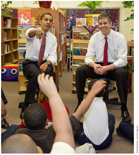 President Barack Obama and Education Secretary Arne Duncan visit a school in Chicago in December 2008, just after Duncan’s nomination