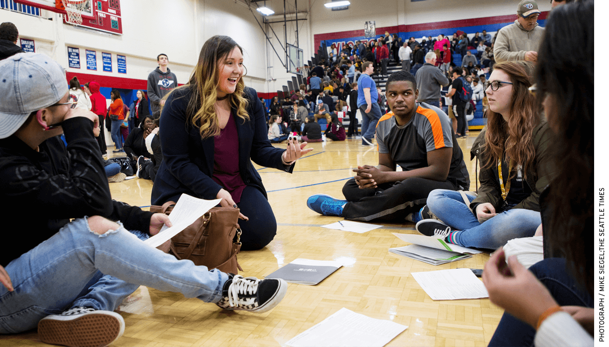 Karla MacIntyre, an admissions counselor at Lipscomb University in Nashville, is one of many mentors assigned to students during an evening at Nashville’s McGavock High.
