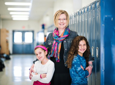 Kendra Espinoza with her two daughters at Stillwater Christian School in Kalispell, Mont.
