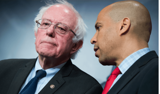Sens. Bernie Sanders, left, and Cory Booker.