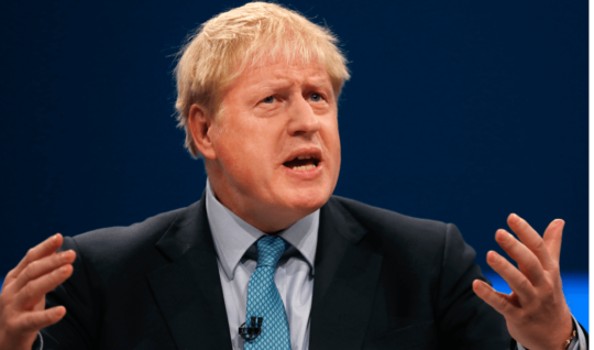 Britain's Prime Minister Boris Johnson delivers his Leader's speech at the Conservative Party Conference on Oct. 2, 2019, in Manchester, England.