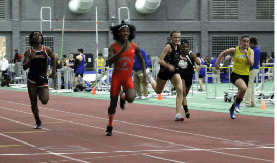 Bloomfield High School transgender athlete Terry Miller, second from left, wins the final of the 55-meter dash over transgender athlete Andraya Yearwood, far left, and other runners in the Connecticut girls Class S indoor track meet at Hillhouse High School in New Haven, Conn.