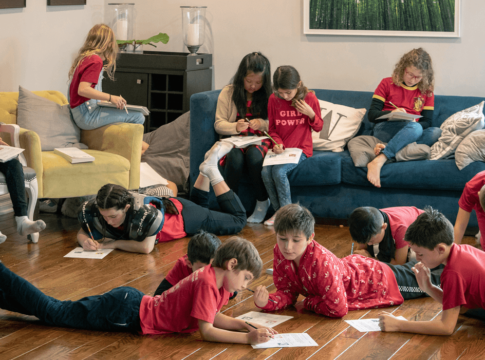 Students from L.A. Unified's Encino Charter Elementary School —dressed in red to support their teachers—attended a community- organized “strike school” in an Encino, Calif., home. Parents took turns hosting children during the teacher strike.