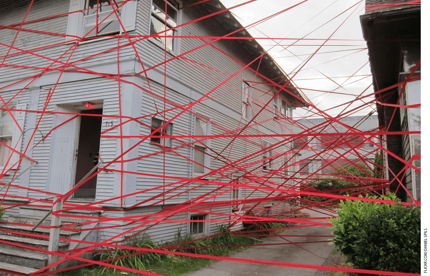 Building covered in red tape