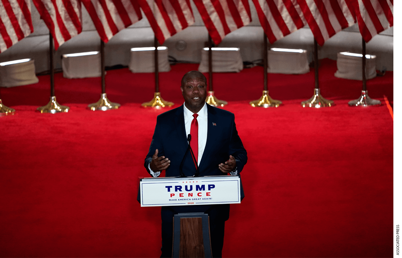 Senator Tim Scott speaking at a podium