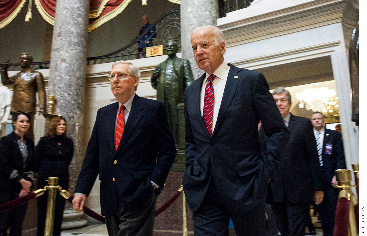 Mitch McConnell and Joe Biden head to a joint congressional session to tally the 2016 electoral college votes on January 6, 2017.