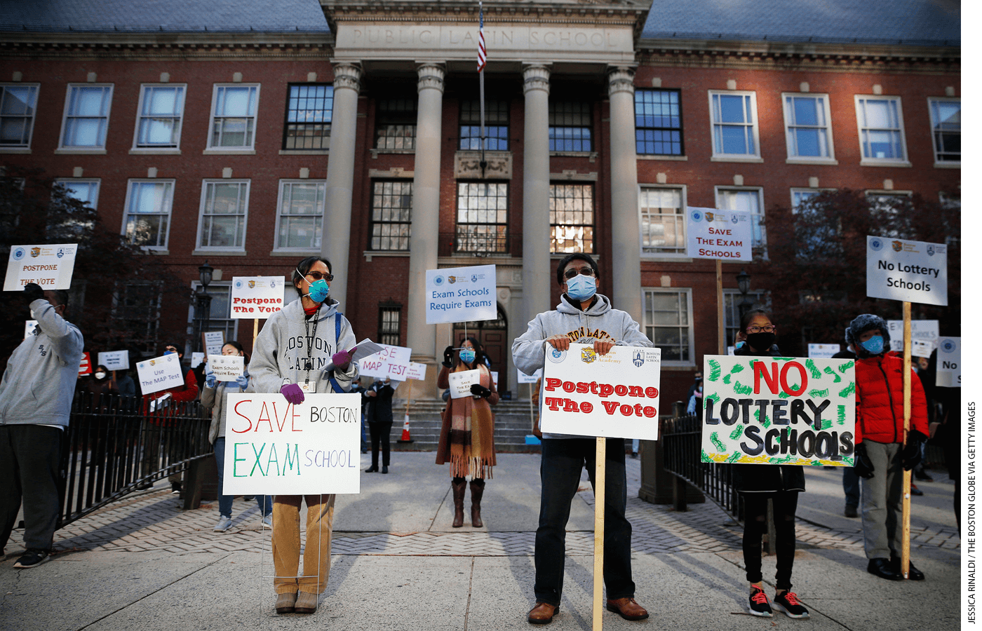 Protesters calling for Boston schools to keep the admissions exam in place for exam schools rally outside of Boston Latin School in Boston on October 18, 2020.