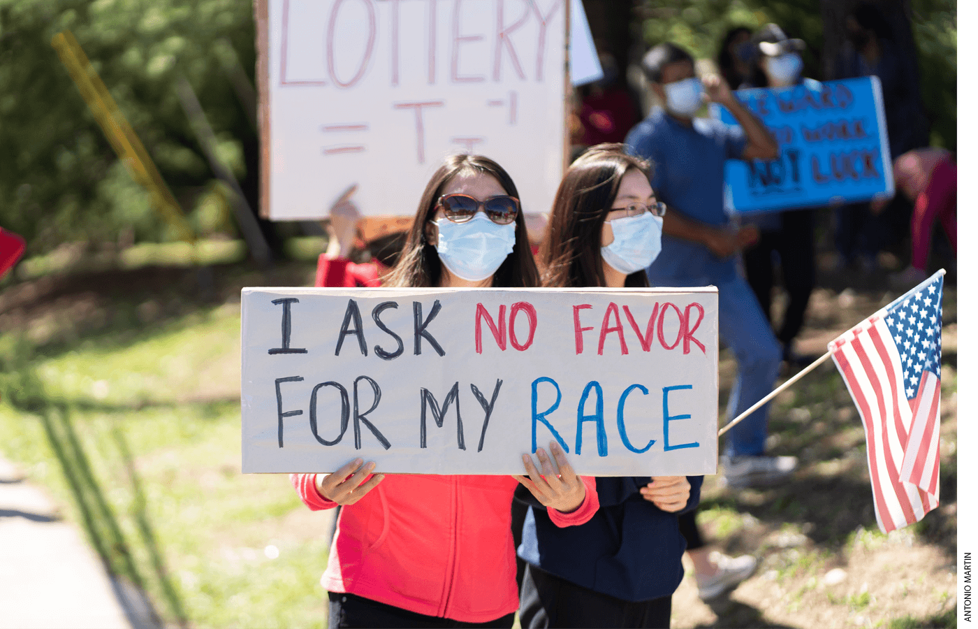 Parents and students hold a protest over admissions changes at Thomas Jefferson High School in September 2020, in Fairfax County, Va.