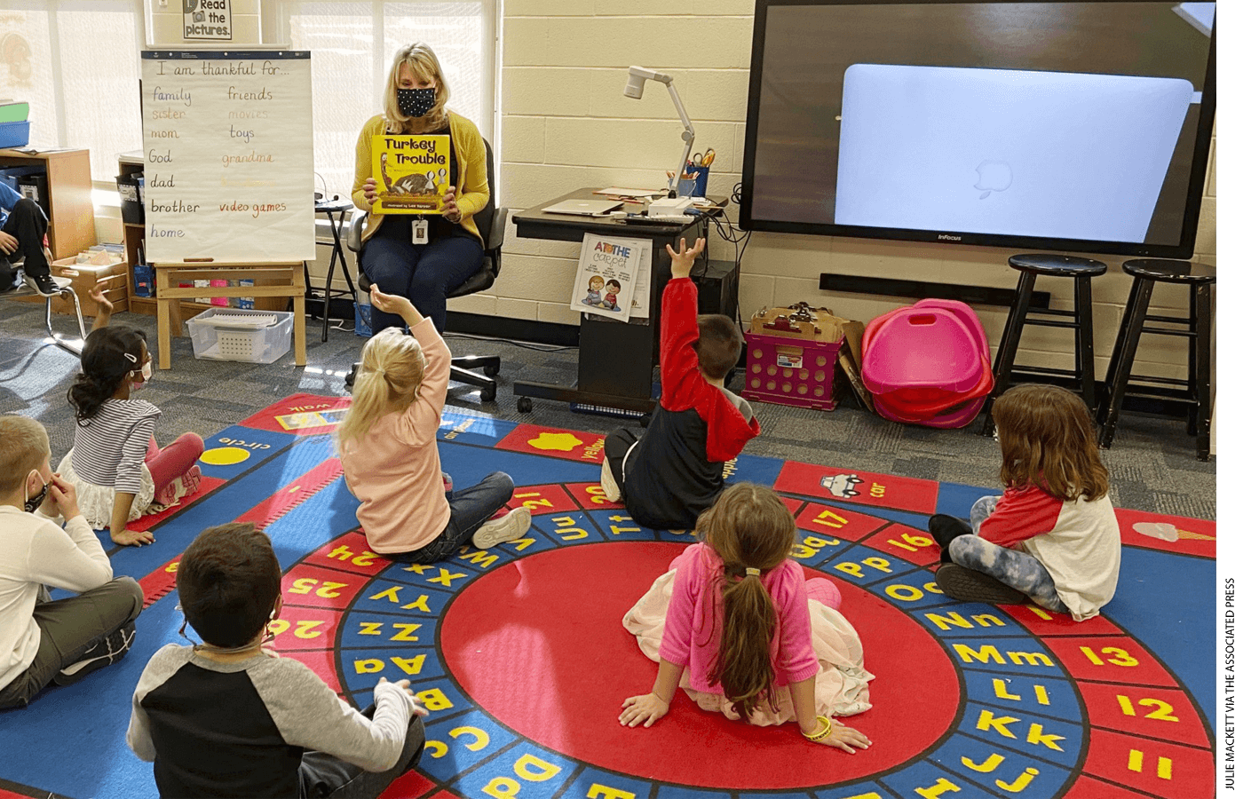 Kindergarten teacher Julie Mackett conducts her class at Ft. Meigs Elementary School, in Perrysburg, Ohio.