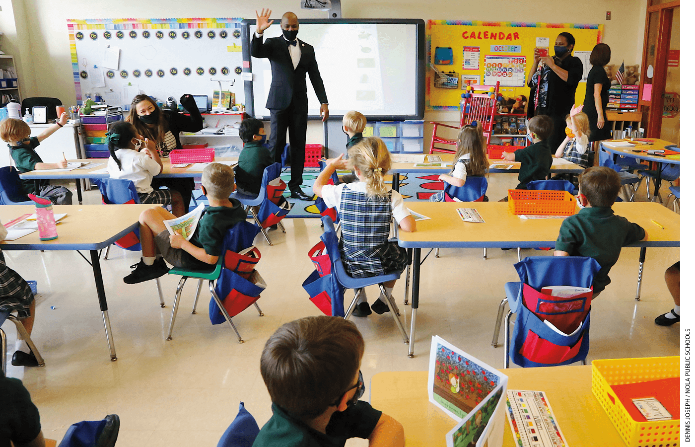 Superintendent Henderson Lewis Jr. stands in front of a class at Edward Hynes Charter School after the school resumed in-person learning in October 2020.