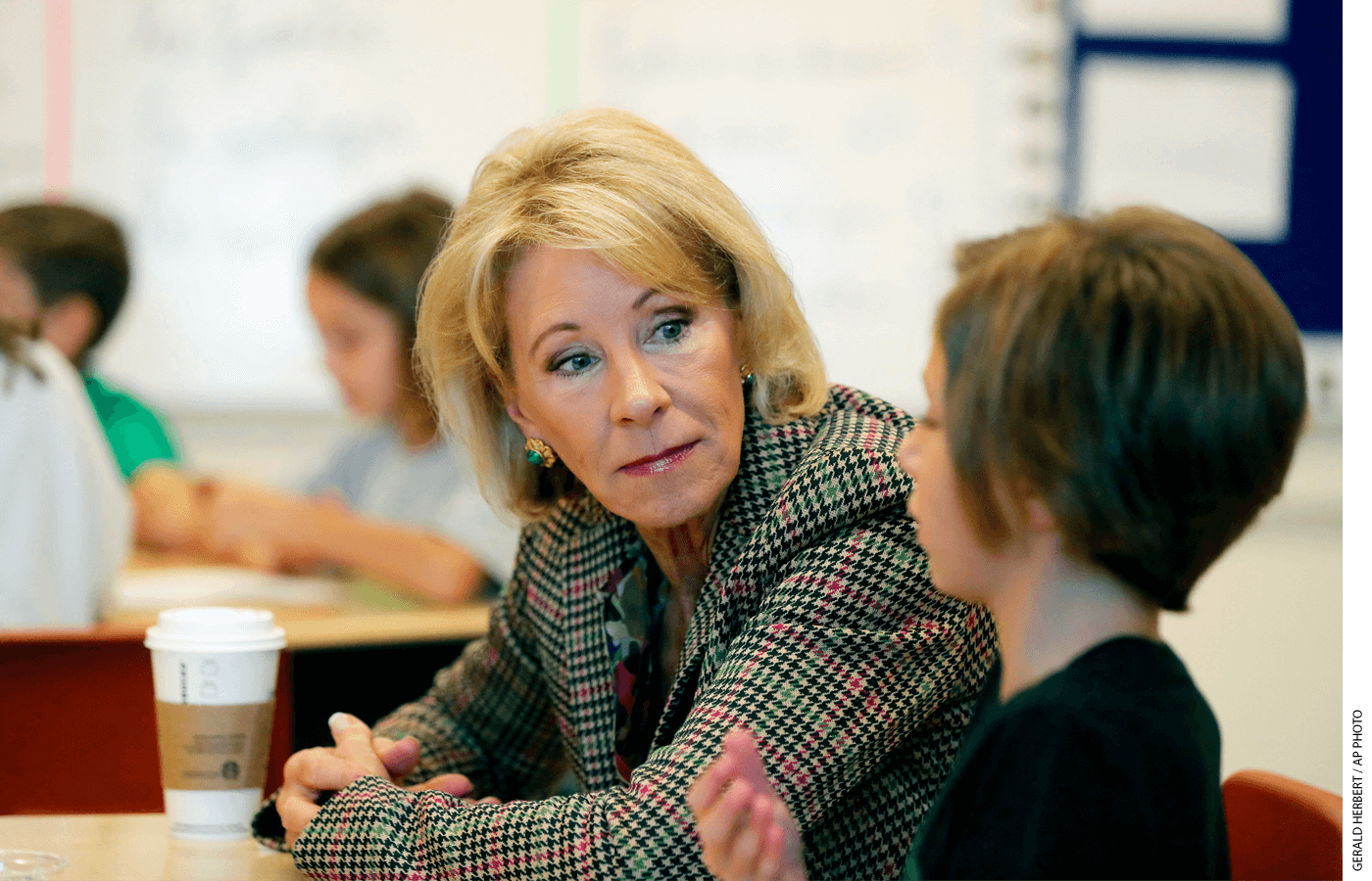 Education Secretary Betsy DeVos visits a classroom at the Edward Hynes Charter School in New Orleans, Friday, Oct. 5, 2018.