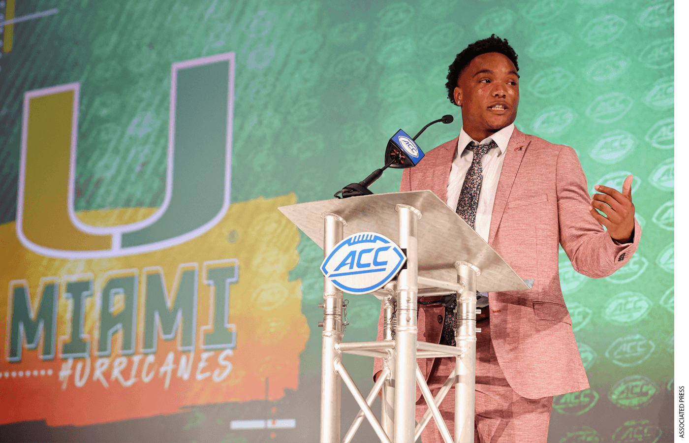 University of Miami quarterback D'Eriq King speaks from behind a podium