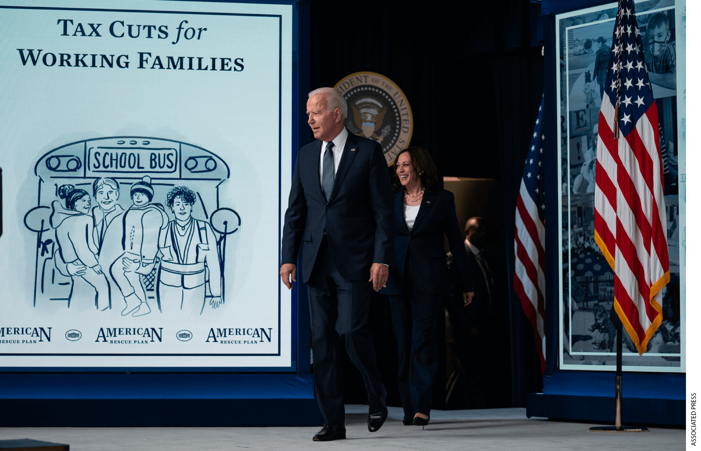 US President Joe Biden and Vice President Kamala Harris arrive for an event to mark the start of monthly Child Tax Credit relief payments, in the White House complex, July 15, 2021. 