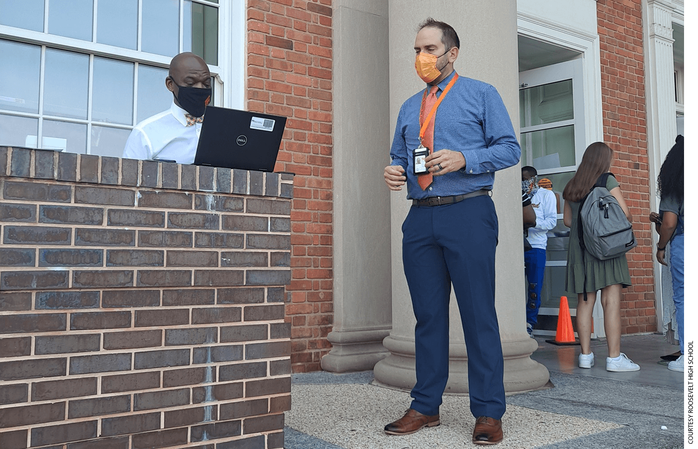 Roosevelt Principal Ralston (right) consults with Resident Principal Donnell Cox.