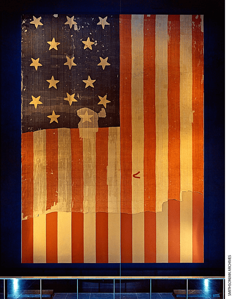 The original Star-Spangled Banner, which flew over Fort McHenry in 1814 and inspired the words of our National Anthem, as it was displayed in what is now the National Museum of American History.