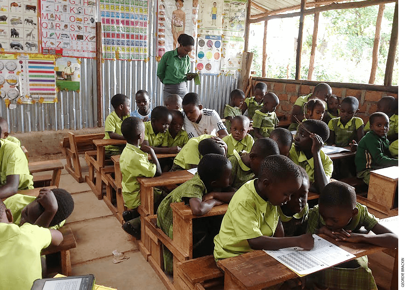 Sixth-grade students tutoring 1st graders in Kenya. In the pilot project, Bridge analysts found that the tutoring drove learning gains in math but not in reading.