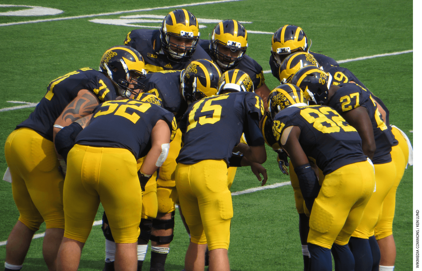 Image of a football huddle