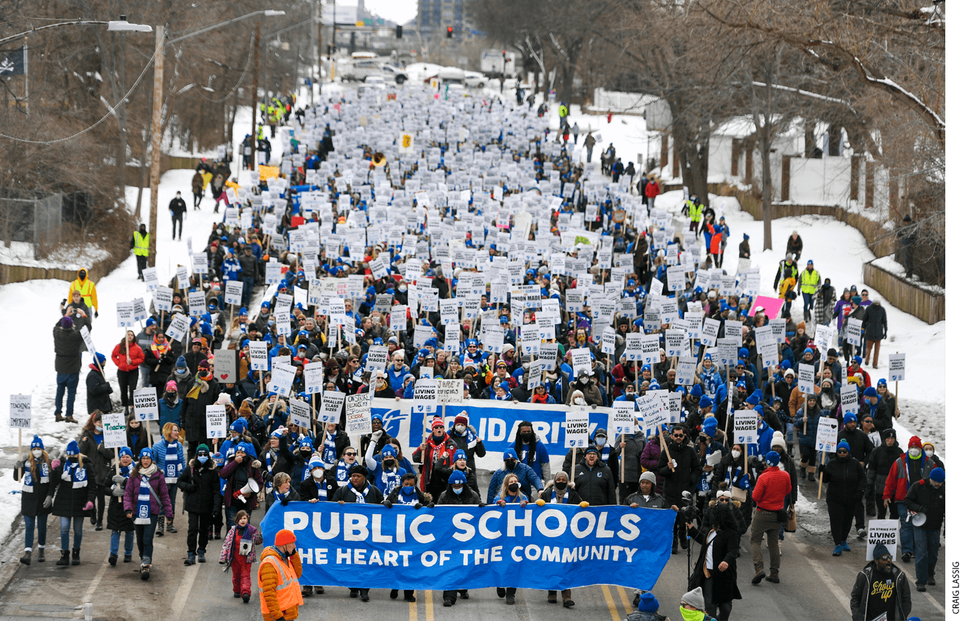 Teachers and supporters march from the MPS Nutrition Center to the John B. Davis Education Service Center during a rally in the first day of the teachers strike Tuesday, March 8, 2022. This is the city district's first teachers strike since 1970.