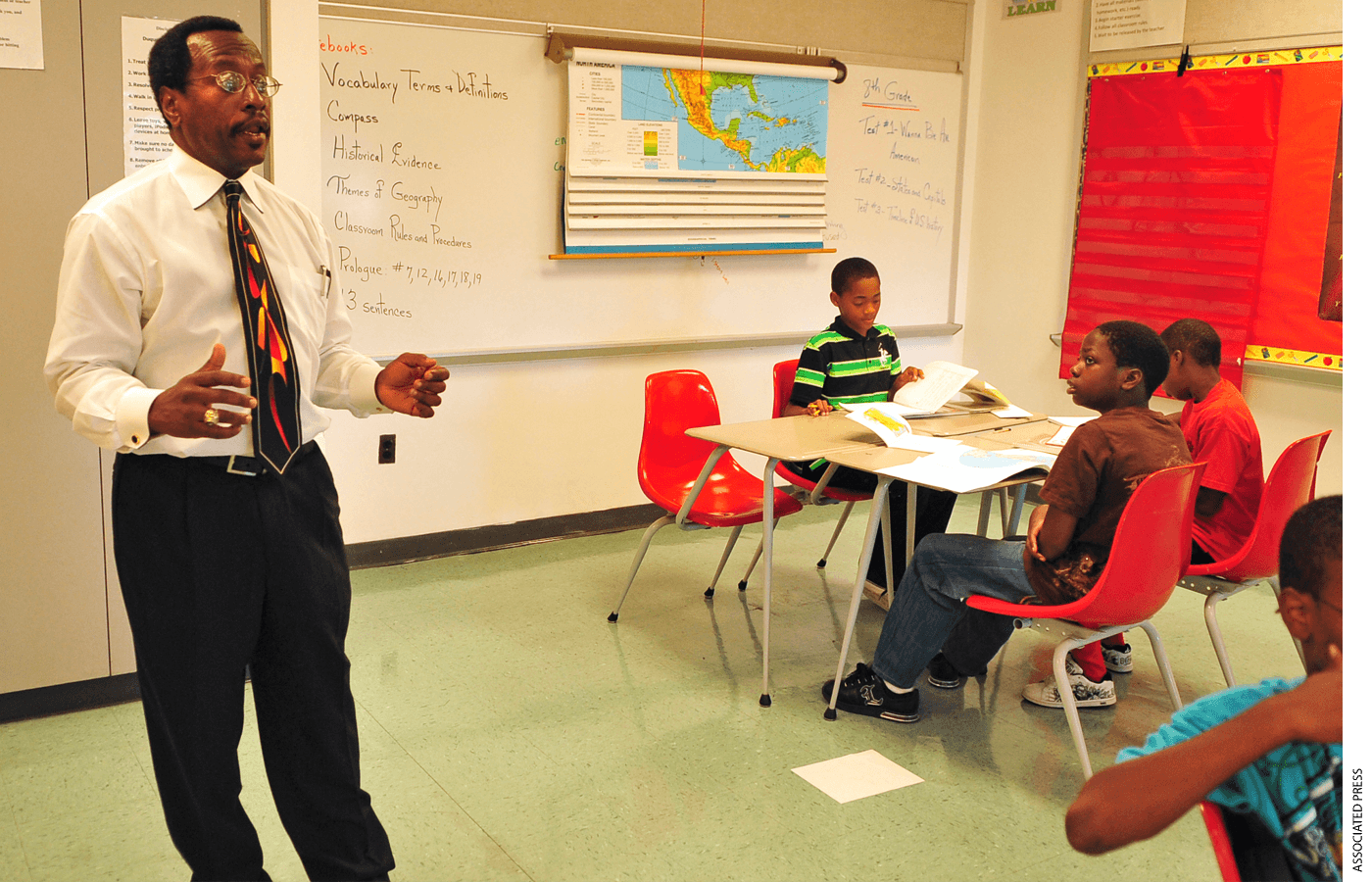 In this Sept. 2, 2010 photo, Martin Andrews teaches a History class at Duquesne City School in Pittsburgh.