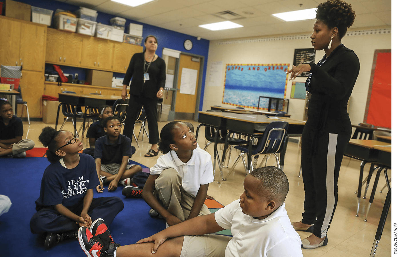 5th-grade math teachers Brittney Bentley and Nicole Plowman co-teach a multiplication lesson at Lucy Laney Community School in Minneapolis.