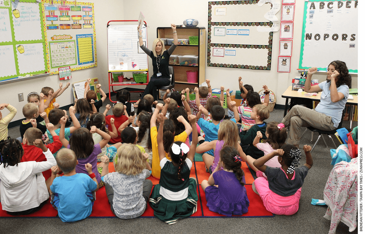 Co-teachers Ann Renee Evans and Cassandra Hinson lead kindergarten storytime at Connerton Elementary in Land O' Lakes, Florida.