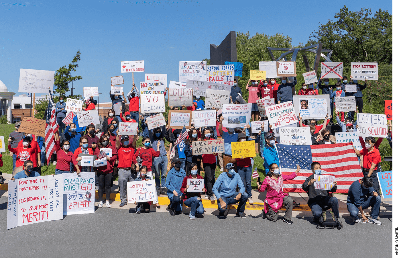 About 200 people protested the removal of merit-based admissions at Thomas Jefferson High School for Science and Technology in Virginia. The author is in the front, in pink.