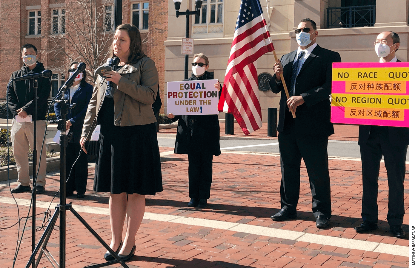 Pacific Legal Foundation attorney Erin Wilcox, pictured here at the microphone, filed a lawsuit against the Fairfax County School Board, alleging anti-Asian discrimination.