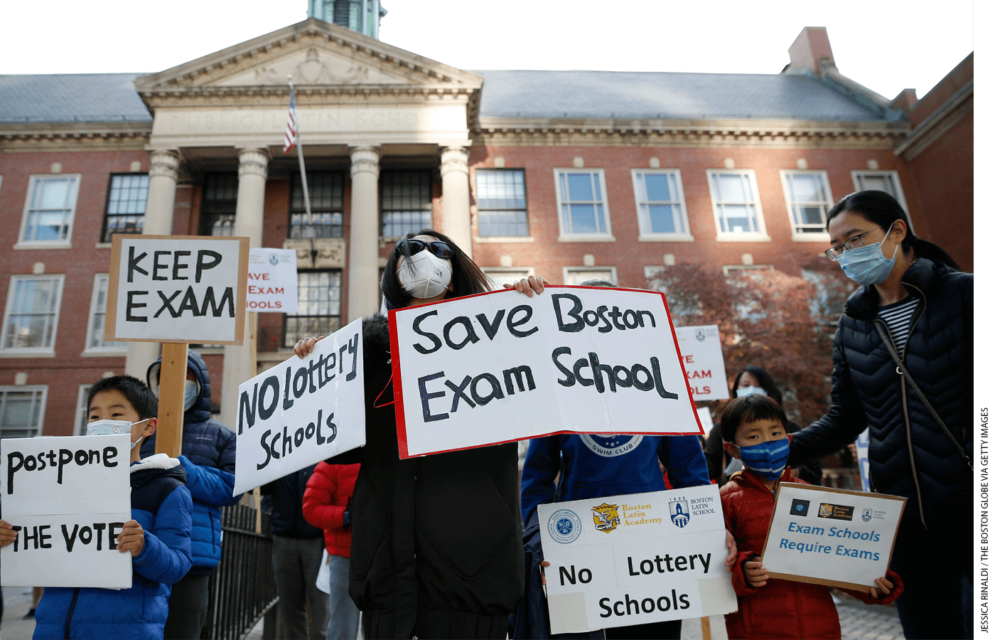 Protesters rally in favor of the Boston Latin School entrance exam in October 2021.