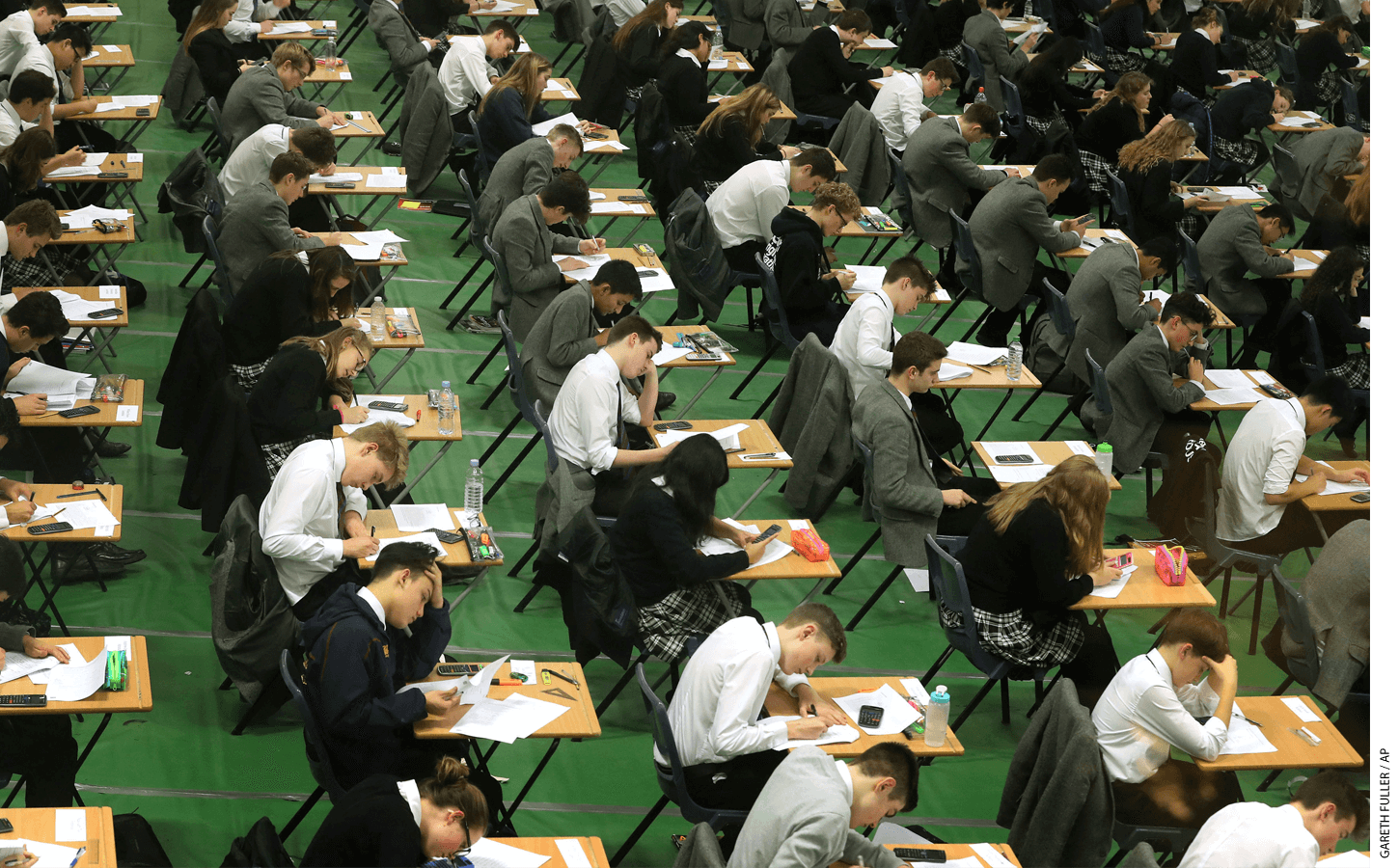 Students in London sit for their PISA exams in 2017. Although the United Kingdom was among the top-scoring countries, Asian nations like China and Singapore performed better.