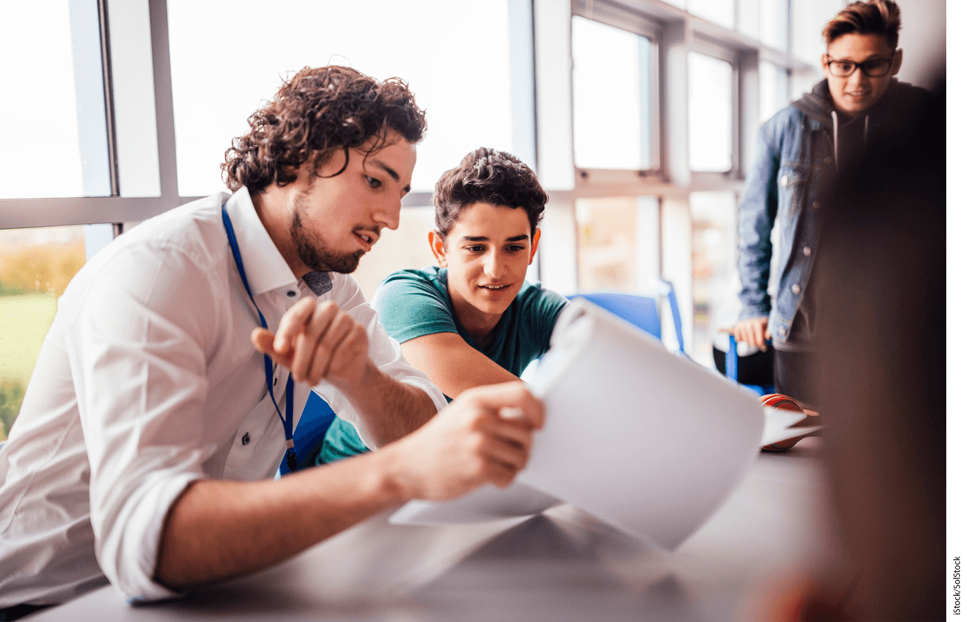 A tutor works one-on-one with a student