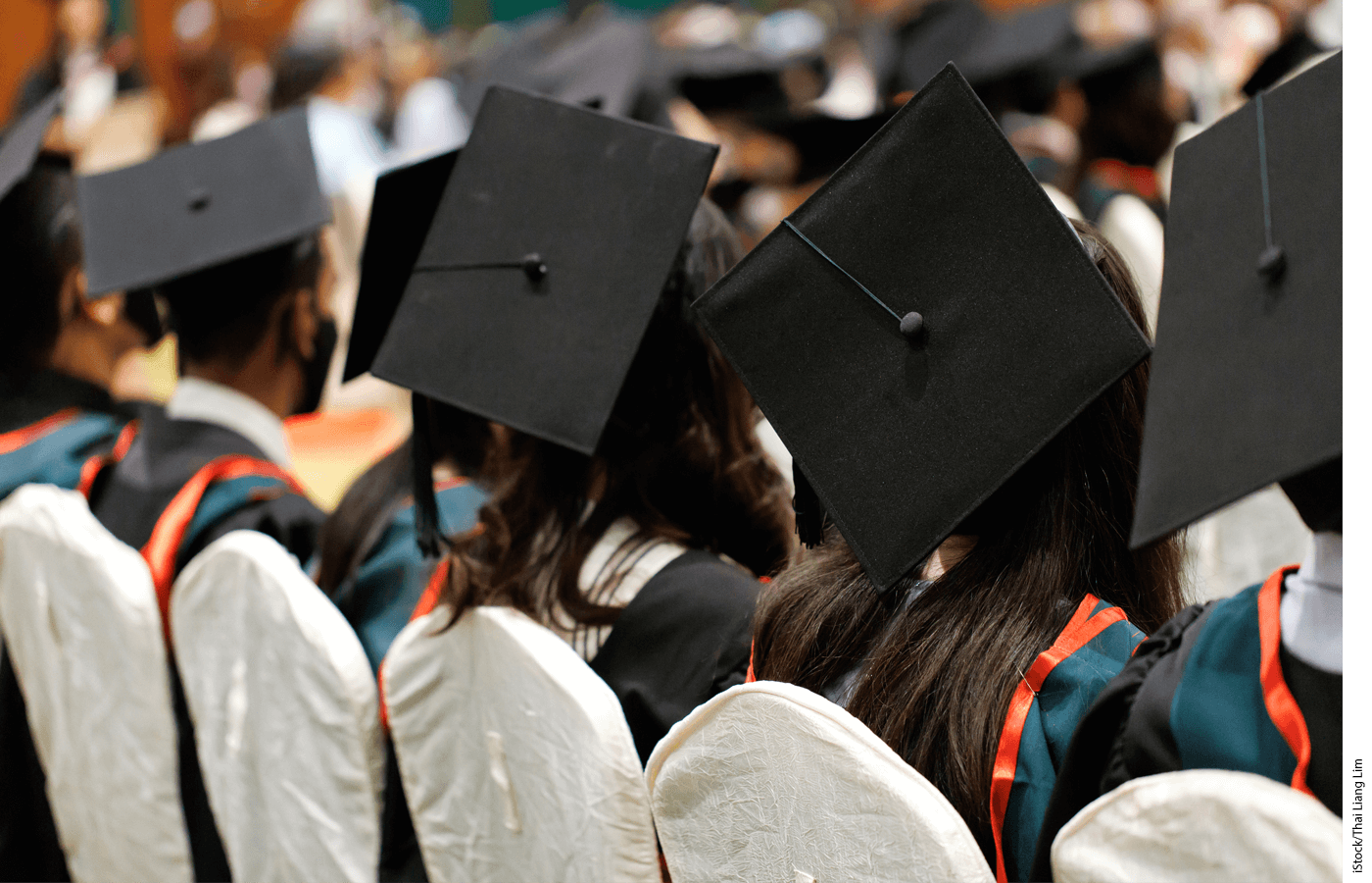 Image of students sitting at graduation