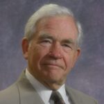 John E. Coons