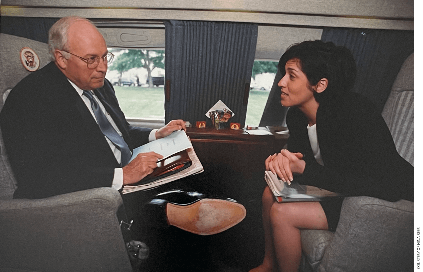 Vice President Dick Cheney and Nina Rees sitting across from each other and talking
