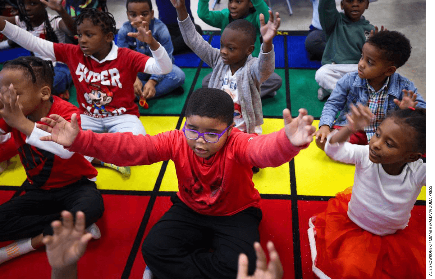 K–2 students at a microschool in Miami’s Liberty City neighborhood act out a story during a lesson.