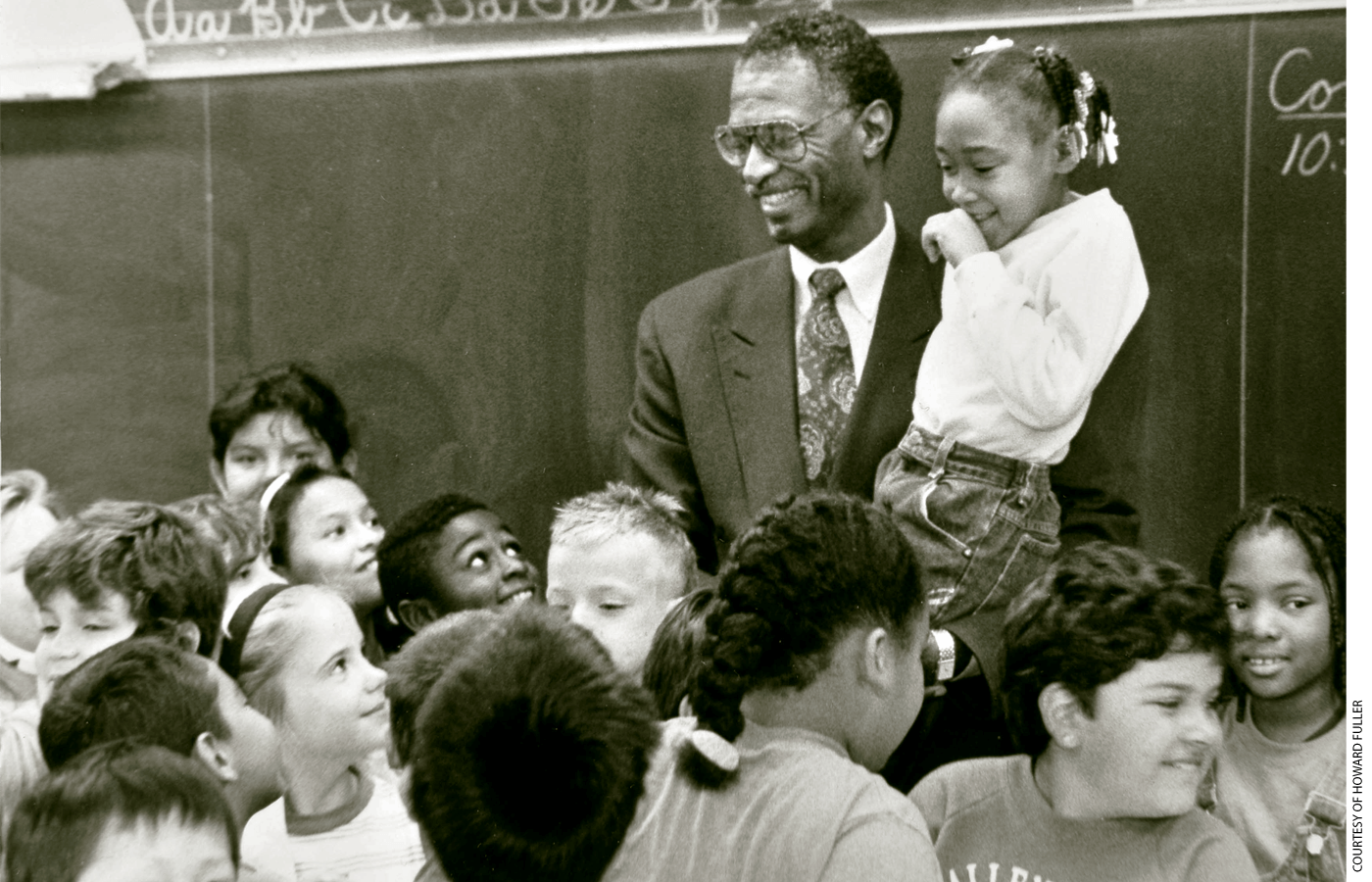 Howard Fuller greets a classroom of Milwaukee Public School students in the early 1990s.