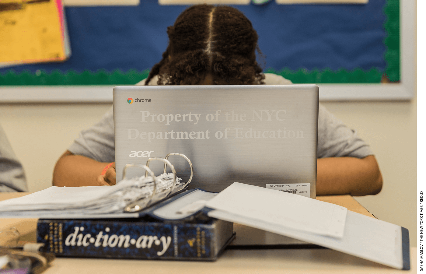 A student at Brooklyn College Academy in New York works on a Google-powered Chromebook in class in 2017.