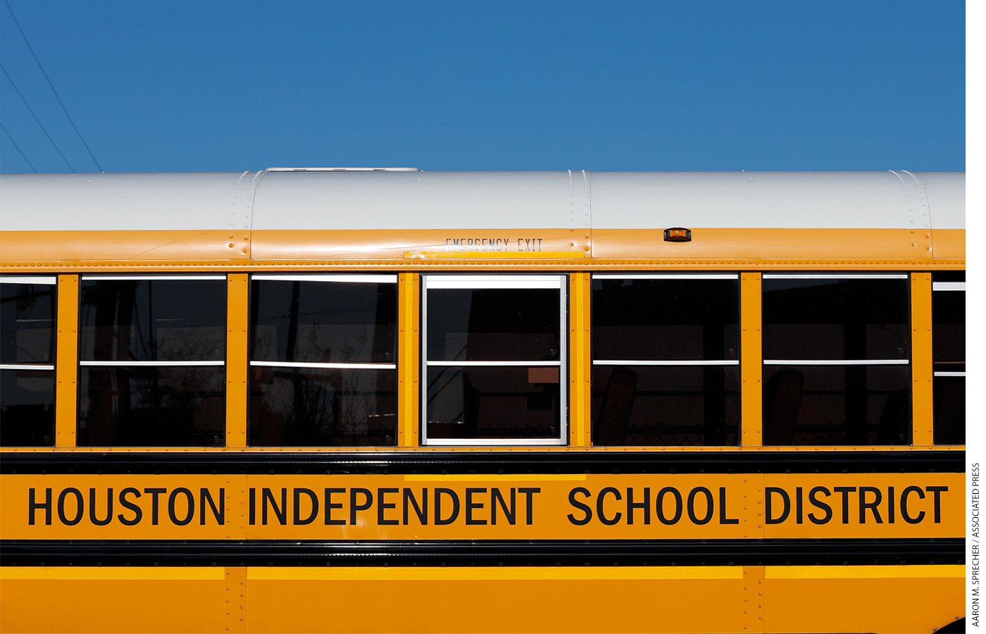 Photo of the side of a school bus from Houston Independent School District