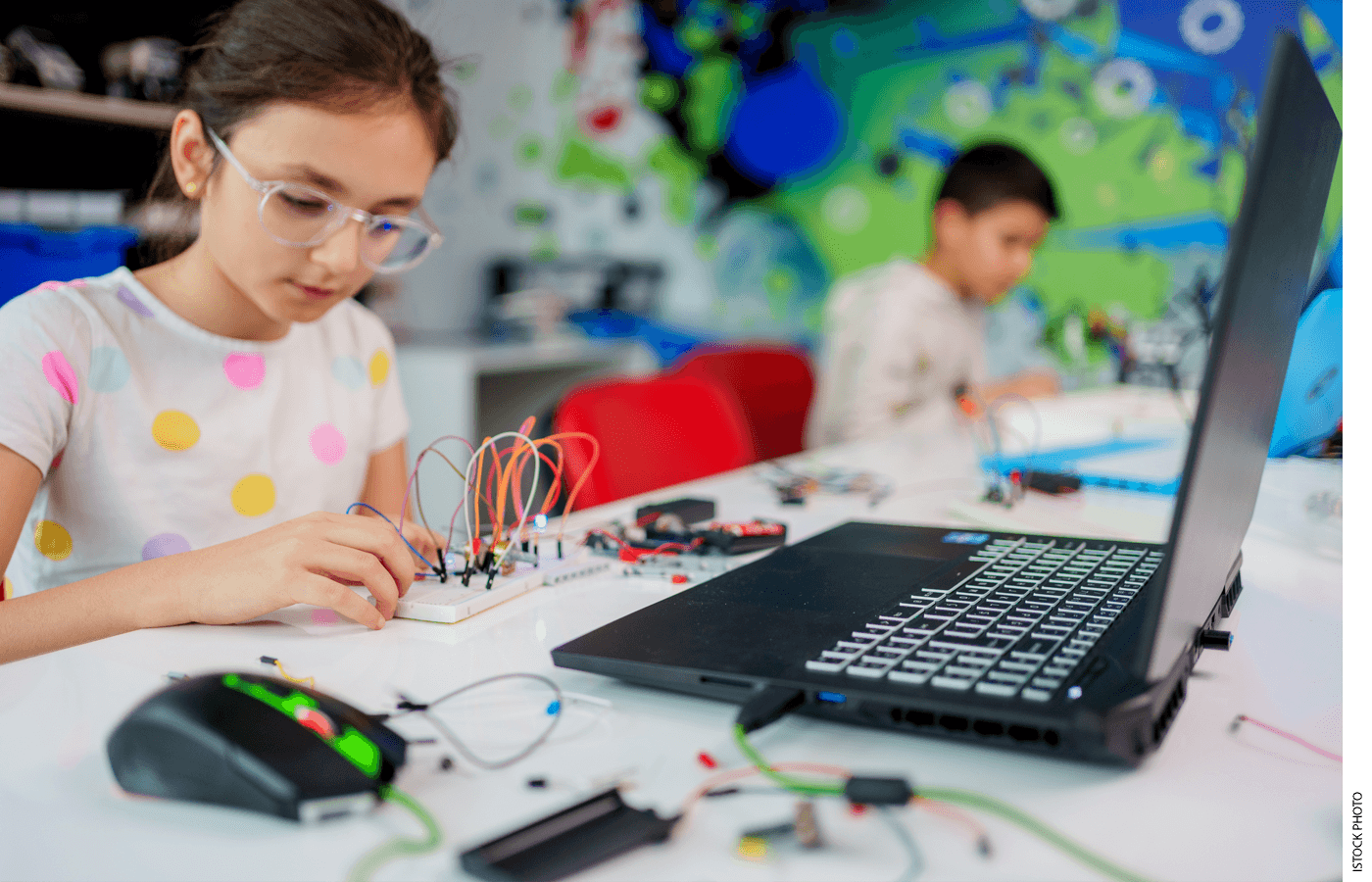 A student works in robotics class
